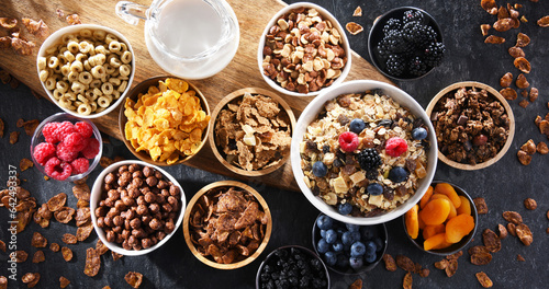 Breakfast cereal products and fresh fruits photo