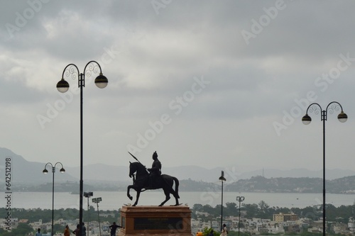Statue of a person in the park at Ajmer Rajasthan, India photo
