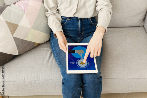 Woman with tablet computer ...