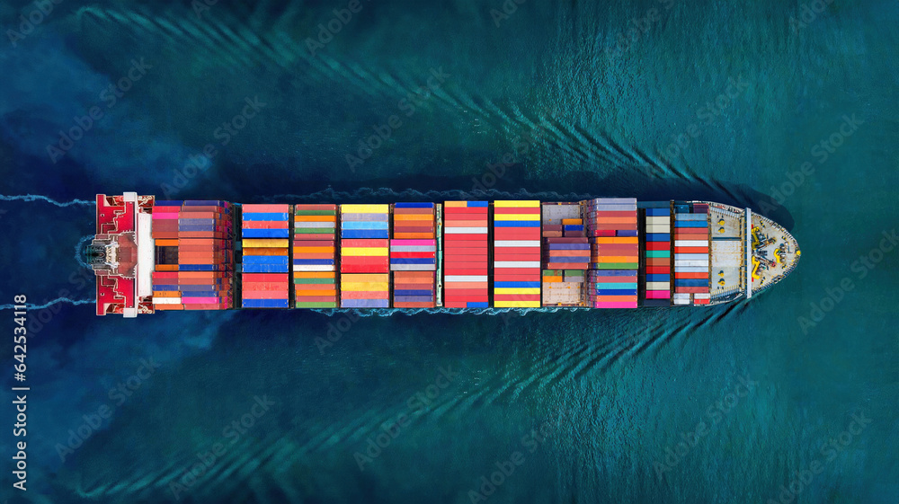Industrial import-export port prepare to load containers. Aerial top view container ship in export and import global business and logistic. Global transportation and logistic business. - obrazy, fototapety, plakaty 