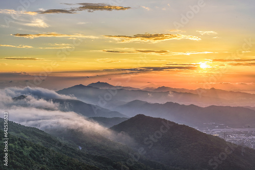 sunrise in the mountains at tai mo shan