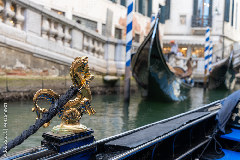 Venetian gondola at the bridge, golden horse.