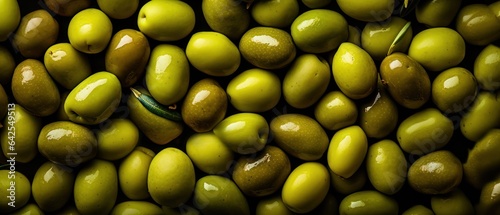 Fotografiet Green olives background full frame banner