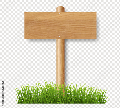 wooden sign on grass
