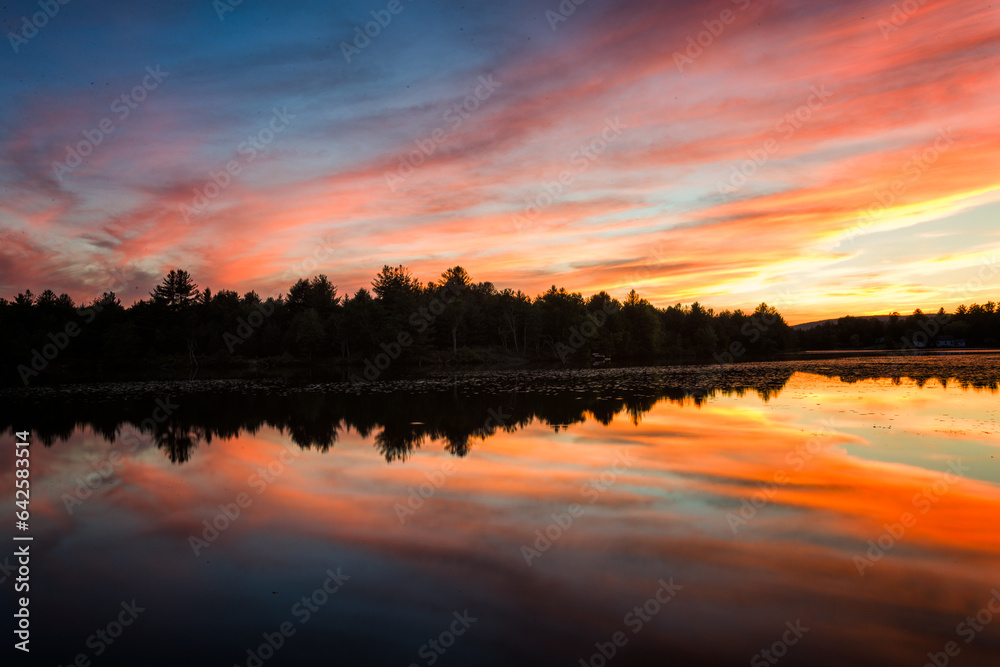 Sunset over Ulster Heights Lake, Ellenville, New York.