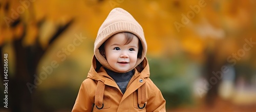 Stylish Asian toddler walks...