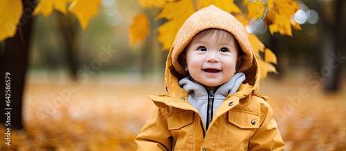 Stylish Asian toddler walks...