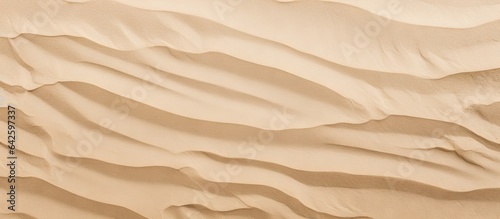 Beach background with light beige sand texture