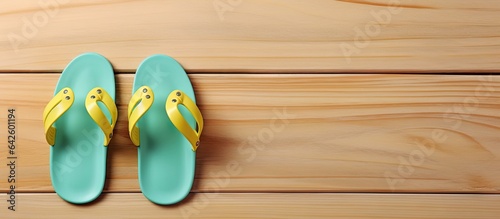 Infant sandals on wood back...