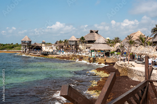 beach with umbrellas and chairs