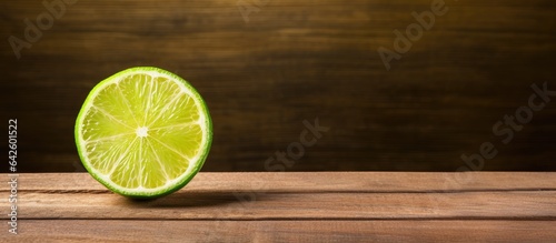 Lime slice on wooden table