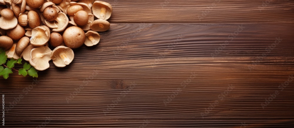 Top down view of wooden table with honeydew mushrooms Plenty of space Top down view of wooden table with honeydew mushrooms Plenty of space