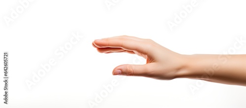 Woman s hand grasps white s...