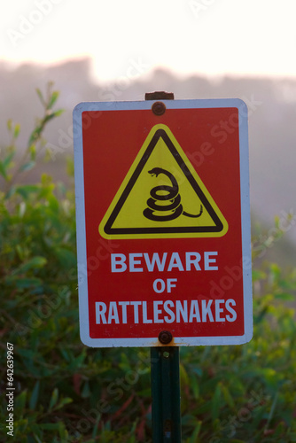 pedestrian advisory to watch out for dangerous rattlesnakes