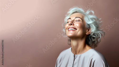 Senior smiling woman with closed eyes, highlighting comfort and calm in retirement