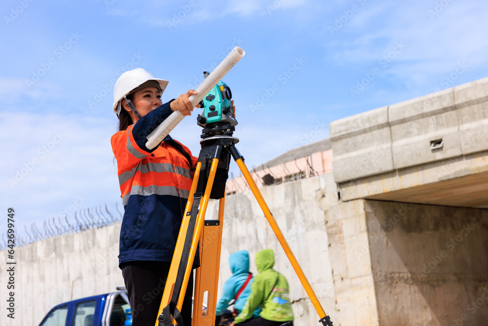 engineer use theodolite equipment for route surveying to build a bridge across the intersection to reduce traffic congestion during rush hours engineer use theodolite equipment for route surveying to build a bridge across the intersection to reduce traffic congestion during rush hours