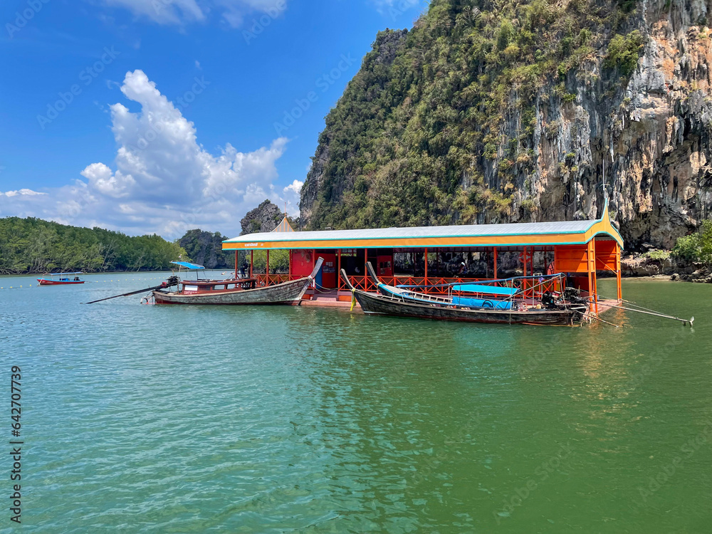 Naklejka premium Long tail boats pier in Phang Nga Bay, Thailand