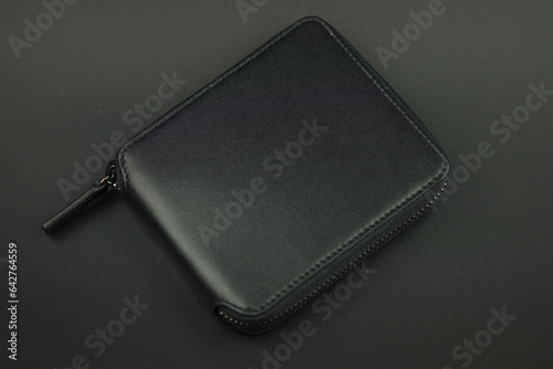 Black stitched wallet men for put money and card. Close up