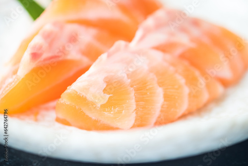 Raw salmon slice or salmon sashimi in Japanese style fresh