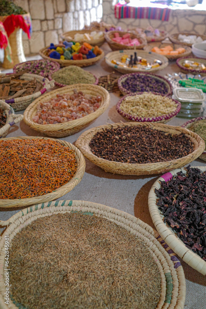 Marrakech, Morocco - Feb 22, 2023: Dried flowers and spices on a stall in Marrakech