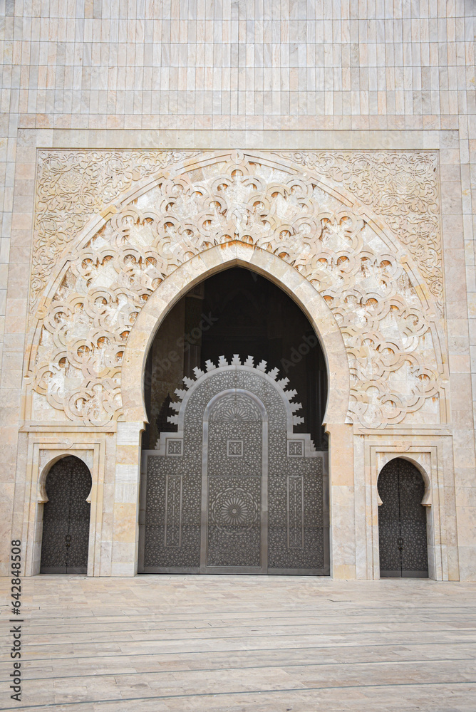 Casablanca, Morocco - Feb 26, 2023: Exterior architecture of the Hassan II Mosque, the largest mosque in Africa Casablanca, Morocco - Feb 26, 2023: Exterior architecture of the Hassan II Mosque, the largest mosque in Africa
