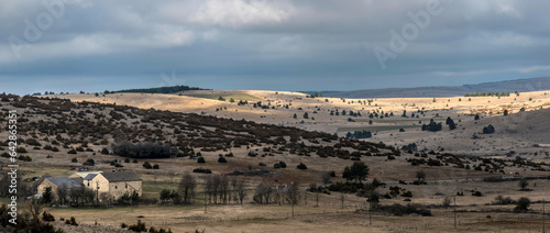 Wallpaper Mural Le hameau du Cayla sur le causse Méjean clair-obscur à Meyrueis, Lozère, France Torontodigital.ca
