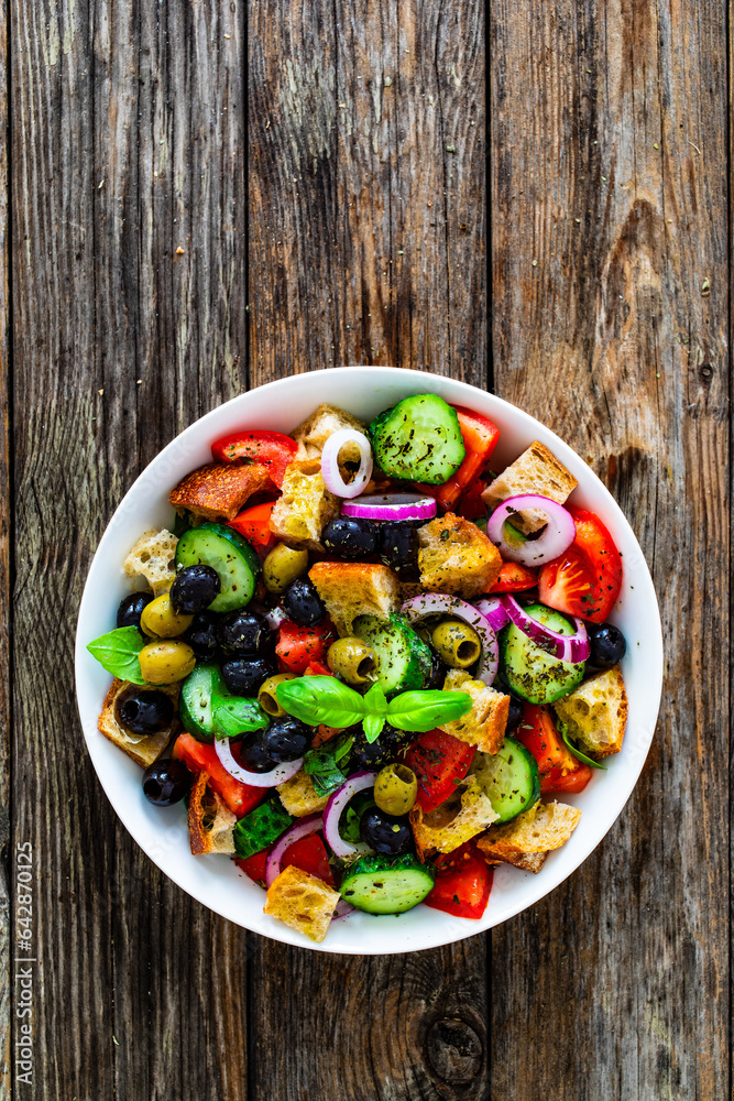 Panzanella salad on wooden table
Panzanella salad on wooden table