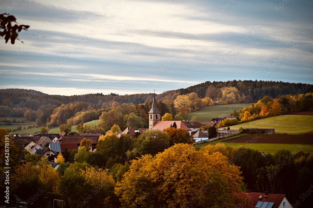 autumn landscape in the mountains with small village in Bavaria