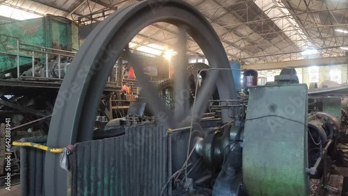 Steam engine flywheel in a Dutch heritage sugar factory