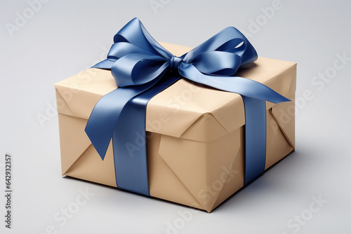 Beige gift box with blue bow on gray background. Generative AI