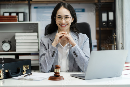 Lawyer portrait, Self confident young woman with crossed arms at office, People, candid portraits, business casual, self confidence, leadership concepts. photo