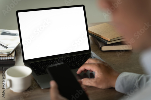 young man working Businessman using a desktop computer of the blank screen