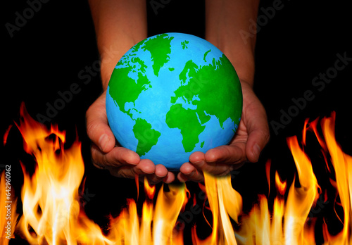 Verdant Globe in Hands over Fire Flames