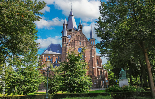 Beautiful neo gothic dutch church in rural town - Oisterwijk, Brabant, Netherlands photo