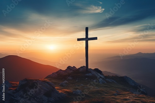 Wooden cross on mountain sunset backdrop is a sacred idea © LimeSky
