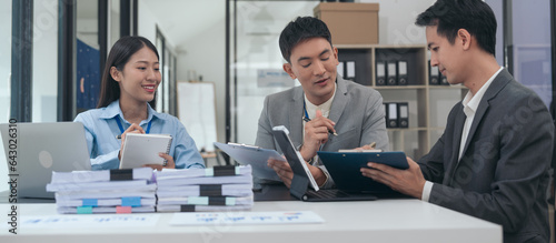Asian business people teamwork strategy corporate meeting in progress, brainstorming ideas, leadership decision-making executives in conference boardroom, productive people engaged in problem-solving