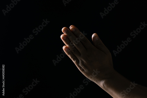 Christian life crisis prayer to god. Woman Pray for god blessing to wishing have a better life. woman hands praying to god with the bible. begging for forgiveness and believe in goodness.