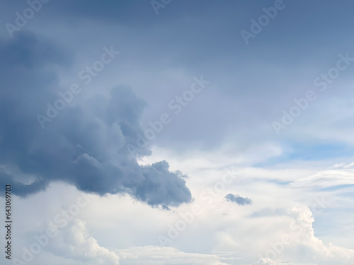 Natural background sky. Blue sky with clouds and sun. Cirrus Clouds Painting the Sky in Gentle Hues. Blue sky with clouds