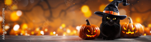 Banner with cute cat in black witch hat on shiny festive gold bokeh background. Halloween design. Pumpkins, glowing Jack O lantern. Postcard with copy space. Generative AI © Катерина Нагірна