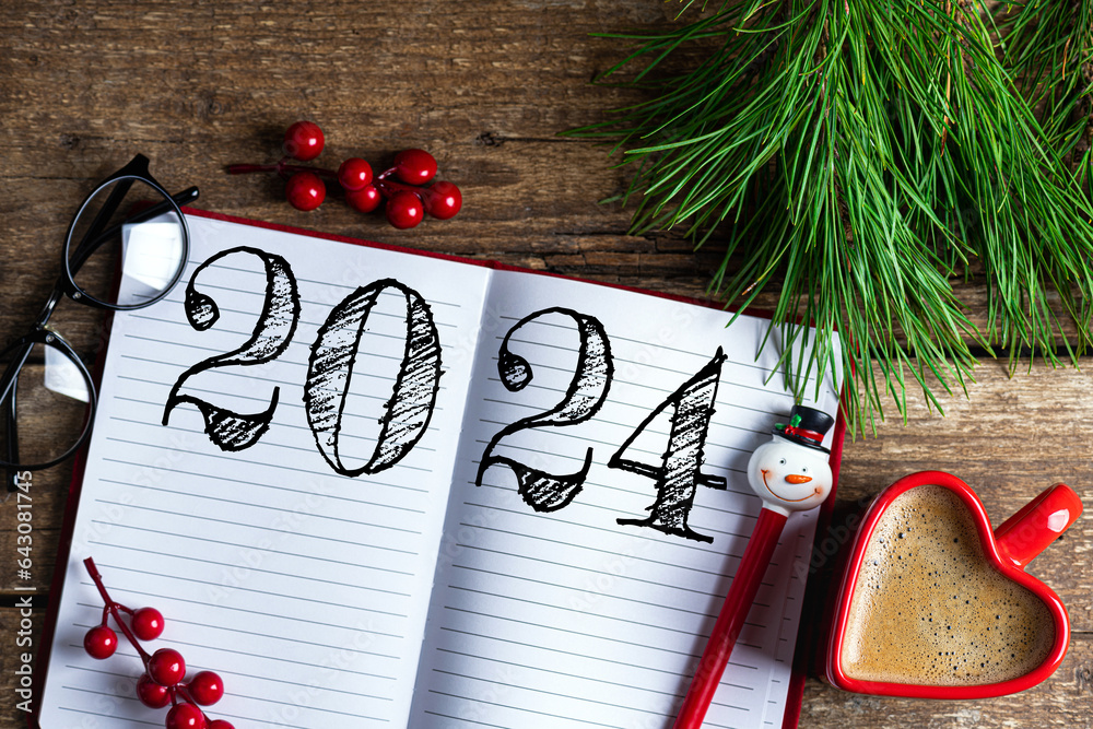 New year resolutions 2024 on desk 2024 resolutions list with notebook