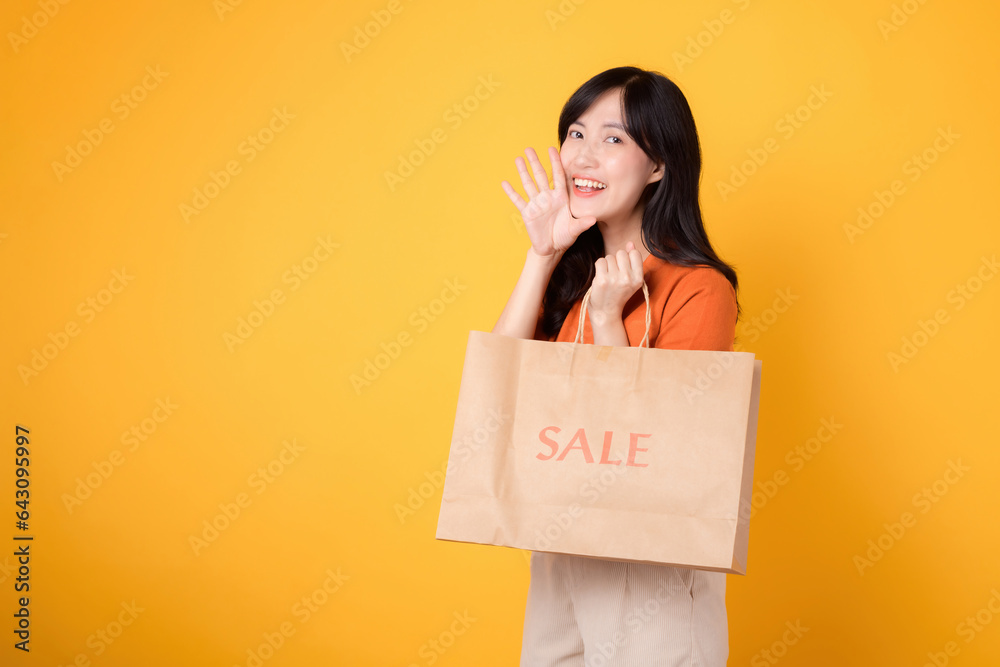 Embrace retail therapy with a cheerful smile! Trendy asian young woman celebrates discounts and fashion finds, showcasing her purchases. Join the shopping fun! Embrace retail therapy with a cheerful smile! Trendy asian young woman celebrates discounts and fashion finds, showcasing her purchases. Join the shopping fun!