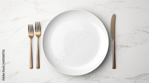 white plate with fork and spoon