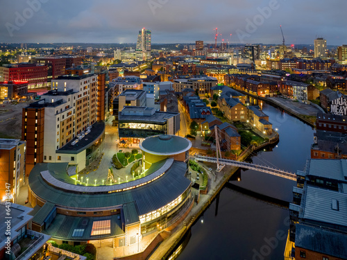 Leeds, West Yorkshire, England. Leeds city centre aerial view looking over the river Aire towards the city, Bridgewater place and Leeds train station at dusk
