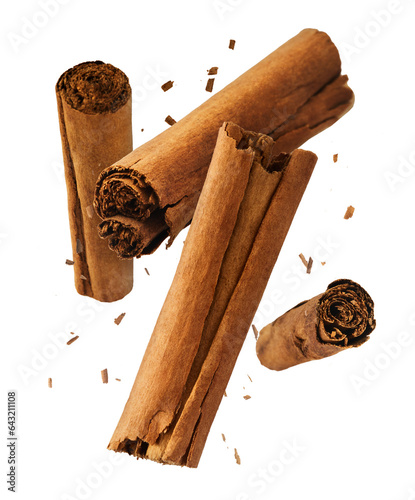 Fototapeta Naklejka Na Ścianę i Meble -  Fresh dried raw Cinnamon stick falling in the air