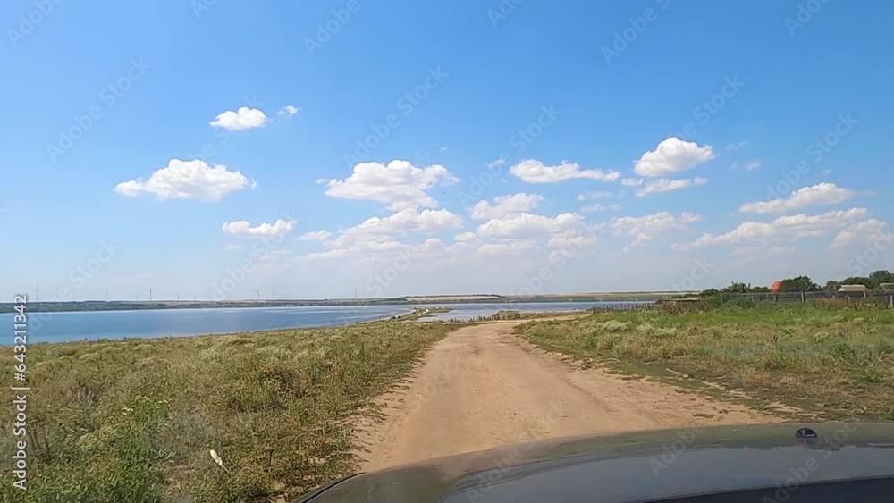 Rural road in a field along Tiligul estuary, Ukraine Rural road in a field along Tiligul estuary, Ukraine