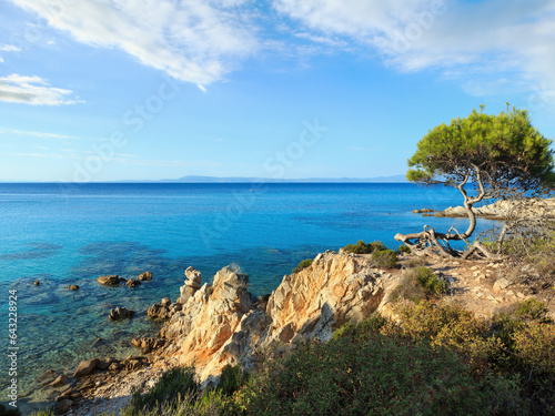 Aegean sea coast landscape with aquamarine water, view near Mega Portokali Beach (Sithonia, Chalkidiki, Greece). photo