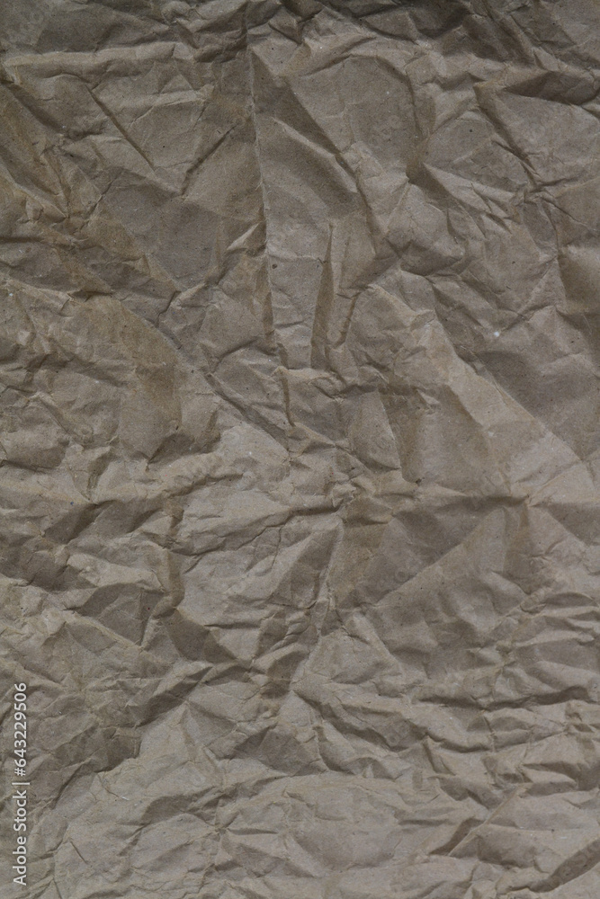 crumpled brown kraft paper. background crumpled brown kraft paper. background
