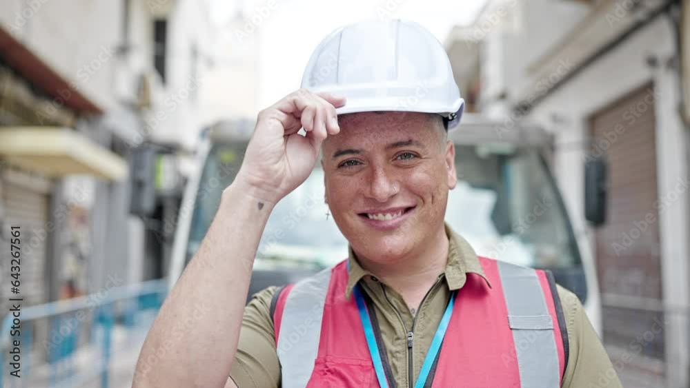 Young caucasian man builder smiling confident wearing hardhat at construction place Young caucasian man builder smiling confident wearing hardhat at construction place