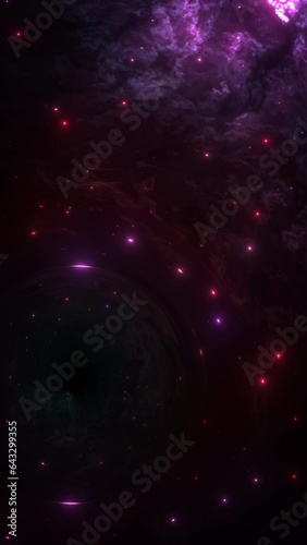 Black hole passing a red blue galaxy nebula star cluster with shining solar systems in infinite cosmos. Vertical 3D animation for depiction of gravitational lens effect of a singularity in universe.