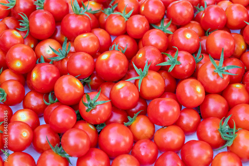 Delicious red tomatoes. Summer tray market agriculture farm full of organic vegetables, selective focus, red tomatoes background.